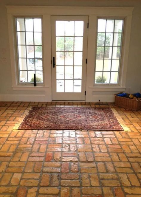 If you want something old-school, you can go with the brick entryway. The iconic red brick will add some texture to your entryway flooring.

#EntryTileInspo
#FrontDoorDecor
#TileDesigns
#HomeEntranceIdeas
#UniqueEntryways
#StylishEntryTiles
#HomeStyle
#ChicEntrances
#TileTrends
#DecorGoals Entry Tile Ideas, Brick Tile Flooring, Brick Entryway, Brick Floor Tile, Unique Tile Floor, Brick Floor Kitchen, Brick Tile Floor, Brick Wall Tiles, Brick Living Room