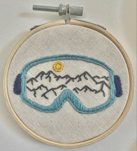 3” embroidery of mountains in the frame of snow goggles Ski Embroidery Design, Embroidery Designs Mountains, Mountain Embroidery Designs, Snowboard Embroidery, Embroidery Mountains Simple, Skiing Embroidery, Masculine Embroidery, Colorado Embroidery, Mountain Embroidery Pattern