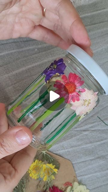 DIY - Basteln mit Kindern on Instagram: "I've just realized that I haven't shown you yet the flower meadow glass I've created for my daughter...🌞. She too created some glasses as a storage to her jewelry! Super easy to do, you only need acrylic paint, a mason jar and pressed flowers 🥰 Another fantastic meadow idea is from @skoy_me who inspired me! #flowercrafts  #diyreels  #naturecrafts  #masonjarideas  #craftreels  #makecreateplay  #ministylemag" Flower Meadow, For My Daughter, Nature Crafts, Flower Crafts, Pressed Flowers, Mason Jar, My Daughter, Acrylic Paint, Flower Power