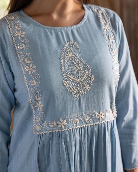 ~NOOR~ Charming Chikankari - New Arrivals! The blend of sky blue with the timeless appeal of Chikankari embroidery Strikes a beautiful visual balance. Textured dobby adds subtle depth to this lightweight kurta in a relaxed fit. Accessories: @tholiaskuber [ Cottons Jaipur, Cotton, Chikankari, Lucknow, Handcrafted, Hand-embroidered, Craftmanship ] #cottons #cottonsjaipur #newarrivals #chikankari #chikankariembroidery #handembroidery #indiancraft #craftmanship #indianart #threads #cottonku... Cottons Jaipur, Visual Balance, Fit Accessories, Chikankari Embroidery, Chikankari Kurta, Women Tunic, New Kurti Designs, New Kurti, Embroidered Kurti