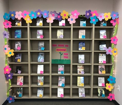 New books are blooming! Pick one! Library display spring Halloween Library, Literacy Week, Cricut Decor, Book Display Ideas, School Library Displays, Library Space, Library Bulletin Board, Library Themes, Library Book Displays