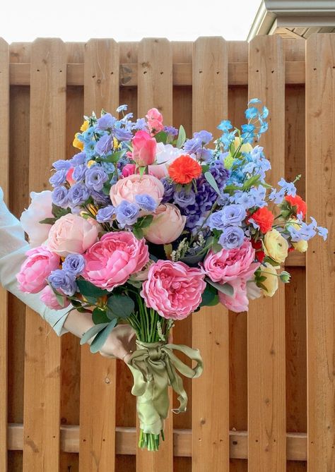 A very large colorful bridal bouquet! It is made entirely of artificial flowers so it will last forever! This listing is for one bouquet. They are made to order so I can make as many as wanted of the xl bridal size. Wild Flower Garden Wedding, Blue Colorful Wedding Flowers, Colorful Flower Bouquet Prom, Pastel Flower Bouquet Wedding, Pink And Blue Wedding Bouquets, Colorful Prom Bouquet, Wedding Bouquets Colorful, Wedding Bouquets Summer, Colorful Flowers Wedding