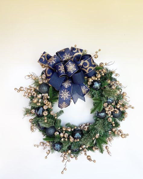 Navy & Gold Christmas Wreath with gold berries and blue ornaments, holiday wreath, winter decor, front door wreath, holiday decor. evergreen Blue And Gold Christmas Wreath, Navy Gold Christmas, Frosted Berries, Gold Christmas Wreath, Large Cardboard Boxes, Blue Ornaments, Navy Ribbon, Evergreen Wreath, Gold Wreath