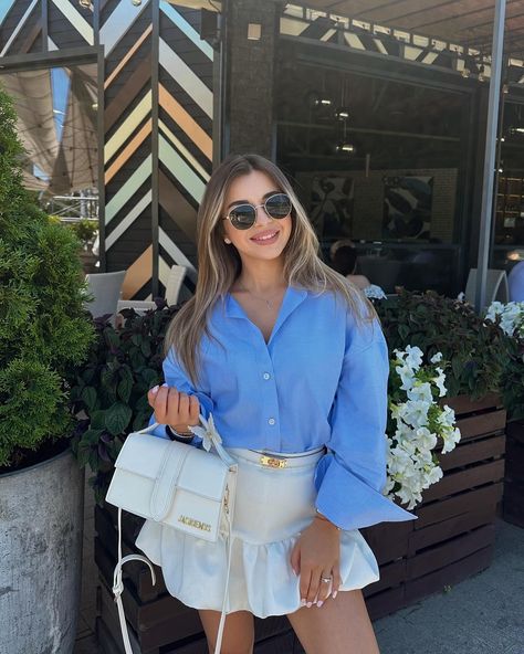 Loving this fresh and stylish look from @kraavchuk! 💙✨ The combo of the blue blouse with the ruffled white skirt is perfect for a chic day out. What do you think of this outfit? 🌸 blue blouse style, white ruffle skirt, casual chic, summer fashion, stylish outfit, trendy day look, street style, fashion inspiration, cute summer outfit, city style #blueblouse #ruffleskirt #summerfashion #streetstyle #fashioninspiration #outfitideas #chiclook #trendyoutfits #citystyle #casualchic White Ruffle Skirt, Cute Summer Outfit, Casual Chic Summer, Skirt Casual, Street Style Fashion, Stylish Outfit, White Skirt, Cute Summer Outfits, City Style