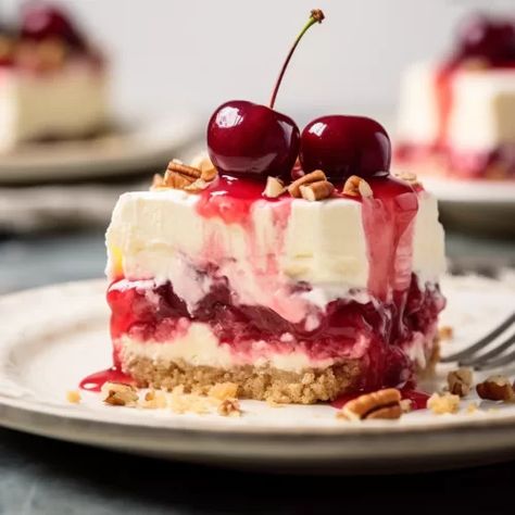 Dive into layers of delight with our Cherry Cheesecake Lush! Creamy cheesecake, vibrant cherries, and a golden Oreo crust create a dessert masterpiece. Perfect for indulgent moments and special gatherings. Get the recipe and treat yourself today! Cherry Cheesecake Lush Layers, Recipes With Cheesecake Pudding, Cherry Cheesecake Lush Dessert, Lush Dessert Recipes, Cherry Cheesecake Lush, Strawberry Cheesecake Lush, Golden Oreo Crust, Cheesecake Lush, Holiday Cooking Recipes