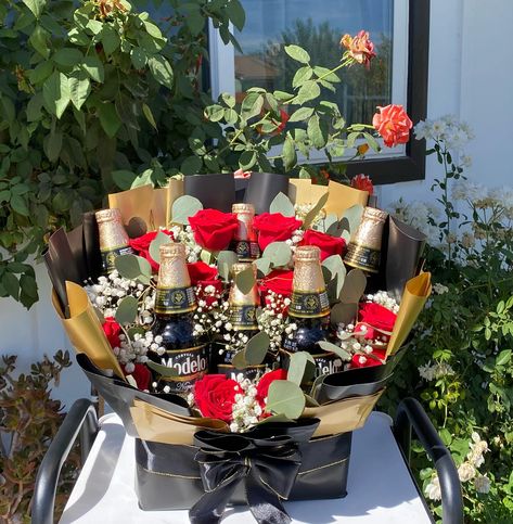 Beer And Rose Bouquet 🌹✨ These have become a Popular Order & I am not mad about it! 🖤🍺 We can customize this to include any drink of your choice. They are also a great display piece as well even after removing the drinks🤍 perfect gift for any occasion ✨ #beerstagram #beerbouquet #beerarrangement #modelo #cerveza #giftsforhim #parael #floresnaturais Beer Bouquet, Handmade Bouquets, Boquette Flowers, Rose Bouquet, Beer Bottle, Bouquets, Gifts For Him, Beer, Perfect Gift