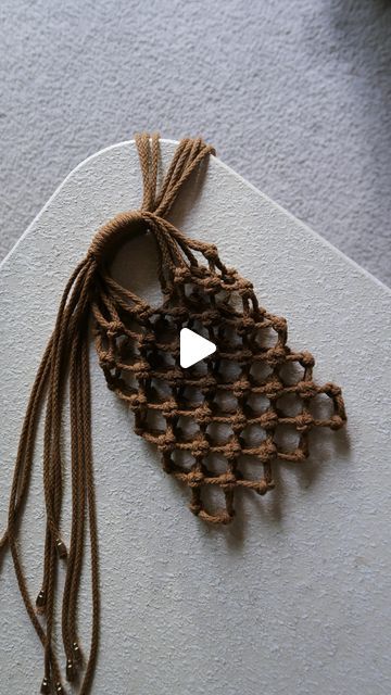 Macrame • Handmade • Tutorial • Fiber Arts on Instagram: "how to make mini macrame bag with Chinese crown knot🪢  #macramephonebag #macramebag #macramebottleholder #macramebottleholder #macramewallhanging #macramelove #macramemakers #macrameforbeginners #macrameminibag #knots #macramestrap #macramebottleholder #macramecoaster #handmade #diy #macrametutorial #diycrafts #diyprojects #diygifts #giftideas #weddingfavors #macramehathanger #macramovement #macramemovement #macramemovements #macramelove #chinesecrownknot" Chinese Crown, Crown Knot, Hat Hanger, Mini Macrame, Rope Knots, Chinese Knot, Rope Bag, Rope Crafts, Macrame Bag