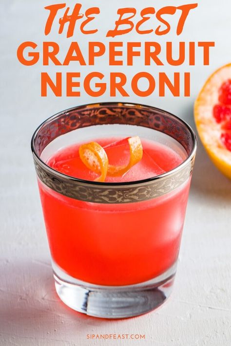 Do you love Negronis but want to change it up a bit? This Grapefruit Gin Cocktail does just that using the flavors of the classic Negroni as its base with the addition of some fresh squeezed grapefruit juice to make a great holiday cocktail. #cocktailrecipe #drinkrecipe #gincocktail #camparicocktail #grapefruitdrinks #mixeddrink 2024 Cocktails, Grapefruit Cocktail Vodka, Grapefruit Bourbon Cocktail, Aperitif Drinks, Grapefruit Gin And Tonic, Grapefruit Juice Cocktail, Grapefruit Negroni, Grapefruit Gin Cocktail, Campari Cocktails