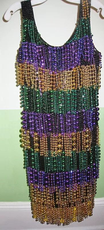 How to Make a Mardi Gras Costumes With Easy DIY Ideas | LoveToKnow Mardi Gras Attire, Mardi Gras Diy, Madi Gras, Mardi Gras Dress, Make Your Own Costume, Mardi Gras Centerpieces, Mardi Gras Crafts, Mardi Gra, Beaded Flapper Dress