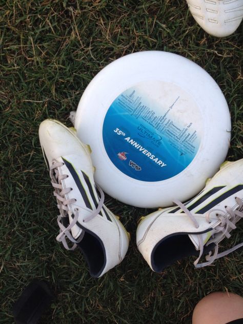 Ultimate frisbee disc and cleats after TUC game Ultimate Frisbee Aesthetic, Frisbee Aesthetic, Corinne Michaels, 2025 Manifestation, Frisbee Disc, Ultimate Frisbee, Book Shelf, Photography Inspo, White Sneaker