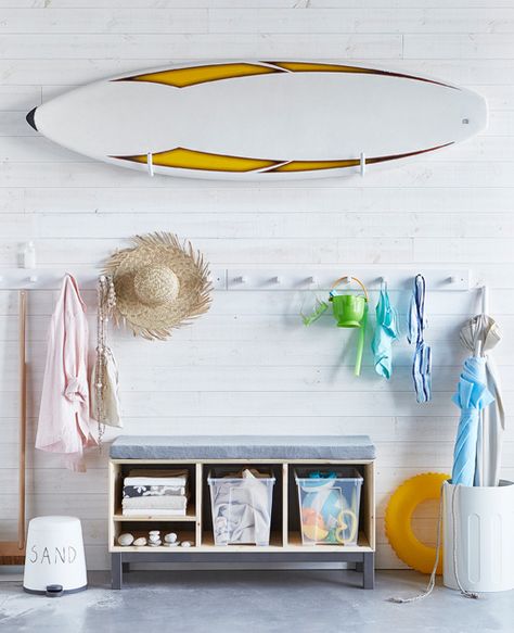 Keep beach gear stored with a rack for a surfboard, a seat to change with boxes… Beach Gear Storage, Ikea Samla, Beach Hut Decor, Knotty Pine Walls, Hallway Organization, Gear Room, Entry Storage, Ikea Ideas, Hallway Storage