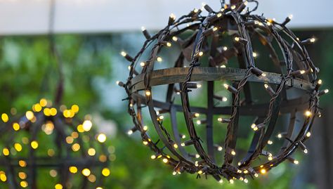 Take those summer/spring hanging baskets, turn upside down and wrap with Christmas lights to illuminate your porch, deck, or patio in the fall/winter! --Lowe’s Creative Ideas Outdoor Globe Lights, Incandescent Christmas Lights, Diy Path, How To Make A Chandelier, Solar Lights Diy, Starry String Lights, Orb Light, Diy Outdoor Lighting, Lights Hanging