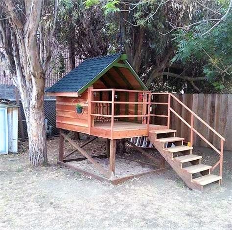 Custom two story tree house for dogs, with sandbox digging pit. 2 Story Dog House, Dog Playhouse, Diy Dog Houses, Playground Backyard Diy, Dog Fort, Dog House With Porch, Dog House Outdoor, Puppy Playground, Dog Backyard