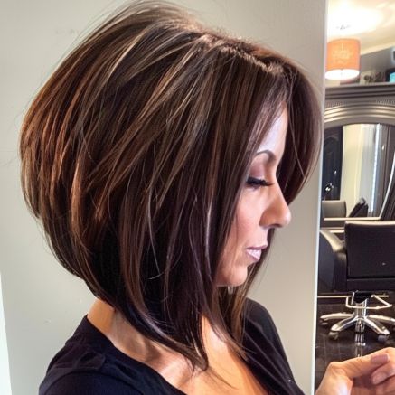 Voluminous Angled Bob with Layered Crown Stacked Bob Haircut With Layers, Angled Bob Haircuts Brunette, Brown Angled Bob, Short Angled Bob With Curtain Bangs, Stacked Brunette Bob, Graduated Layered Bob Haircuts, Angeles Bob Haircut, Inverted Angled Bob, Back Of Stacked Bob Haircut