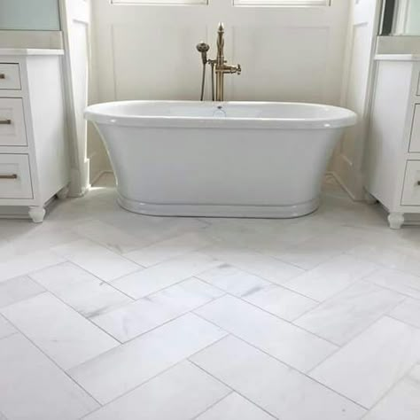 Herringbone pattern Large Tile Bathroom, Herringbone Tile Bathroom, Herringbone Tile Floors, Standing Tub, White Marble Bathrooms, Timeless Bathroom, Honed Marble, Herringbone Tile, The Tile Shop