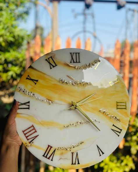 Wall Clock..💛✨ New And Handmade White with Yellow Weaves Wall Clock | Personalized Wall Watch | Best Wedding Gift | Resin Wall Watch | Handmade Watch 👉DM FOR ORDER🙌 HURRY UP GUY'S 🤗🏃 👉MADE BY : @7_sisters_00 👉CONTACT US : 7874517266 7859847810 #walldecor #wallwatch #wallclock #yellowwallclock #decorideas #handmade #handmadewithlove Yellow Wall Clocks, Yellow Clocks, Desk & Shelf Clock, 7 Sisters, White Wall Clock, Resin Wall Clock, Resin Watch, Living Room Cabinet, Resin Clock