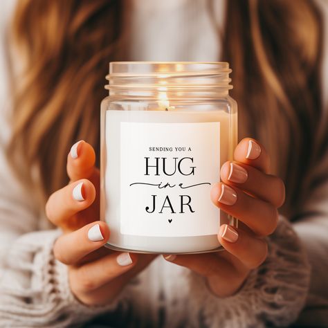 Give the gift of warmth and comfort with our Hug in a Jar Candle! Illuminate your space with our luxurious scented candle to evoke a dreamy ambiance in your home. 🕯️✨️⁠
.⁠
#candles #gifts #scentedcandles #candlelover #handpoured #giftideas #candleaddict #candlelight #soycandle #present #giftidea #soywax #candlesofinstagram To Cheer Up A Friend, Cheer Up A Friend, Love From Afar, Frosted Candles, Home Relaxing, Sending You A Hug, Love Candle, Spice Jar Labels, Candles Gifts