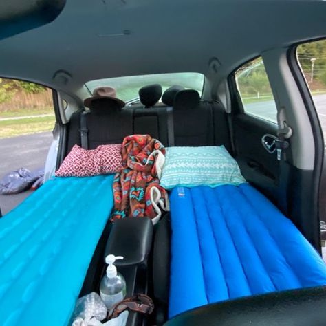 a small sedan with its driver and passenger seats completely laid down, with two sleeping pads blown up for a small sedan car camping set up Car Camping Hacks Road Trips, Back Of Car Camping, Car Camping Sedan, Car Camping Suv, Sedan Car Camping, Suv Camping Hacks, Sedan Camping, Small Car Camping, Suv Living