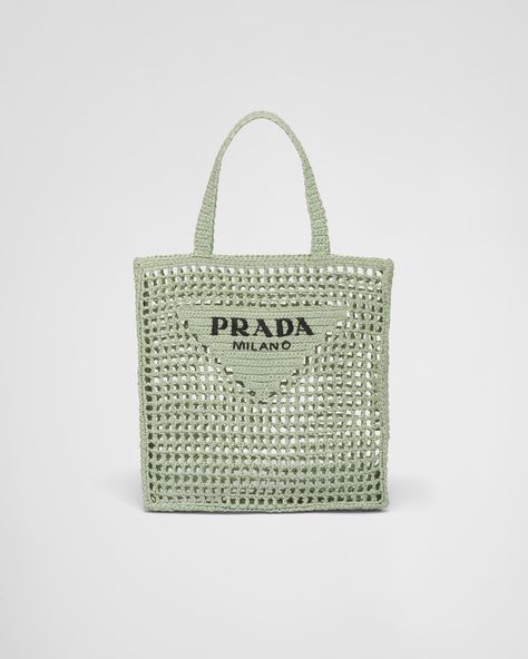 Raffia-effect yarn Crochet workmanship Embroidered lettering logo on the front Unlined Prada Raffia Tote Bag, Prada Raffia, Raffia Tote Bag, Embroidered Lettering, Prada Triangle, Prada Tote Bag, Crochet Tote Bag, Lettering Logo, Crochet Tote