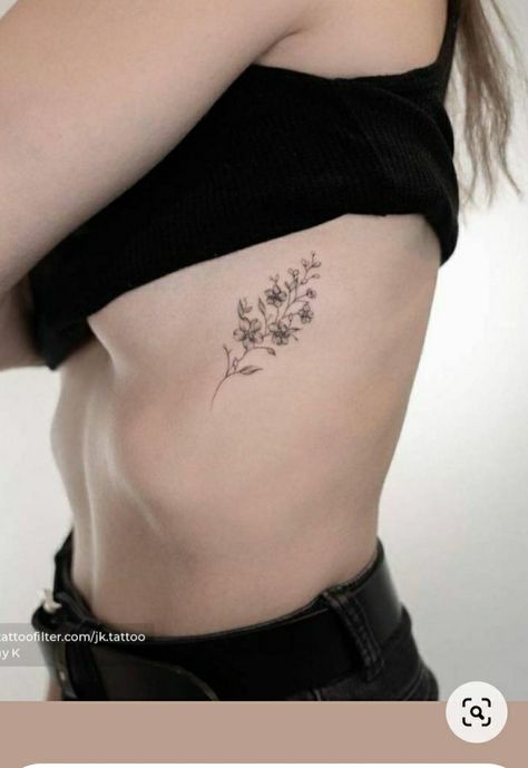 Minimalist Flower Rib Tattoo, Fine Line Flower Tattoo Ribs, Floral Rib Tattoos For Women, Rib Flower Tattoo, Feminine Rib Tattoos, Floral Rib Tattoo, Flower Rib Tattoo, Pelvic Tattoos, Flower Tattoo On Ribs