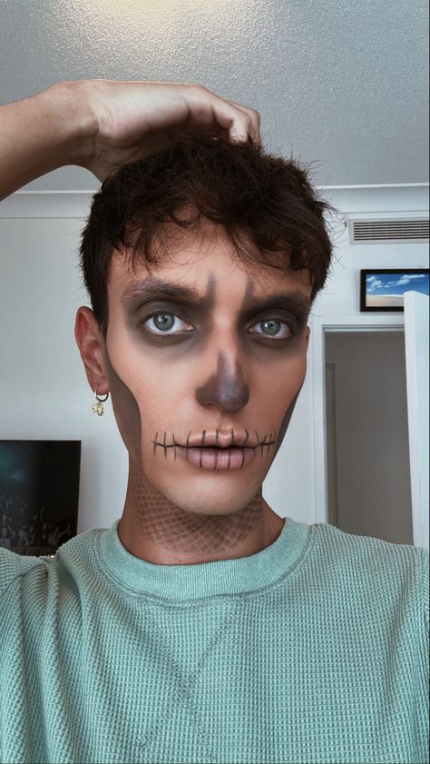 Halloween makeup idea for a skull. Male skull makeup look Skull Makeup Half Face Men, Skeleton Makeup Guy Easy, Men Halloween Makeup Easy, Skull Makeup Men With Beard, Halloween Skull Makeup For Men, Easy Zombie Makeup For Men, Male Skull Makeup Easy, Skull Inspired Makeup, Men’s Skeleton Makeup Easy