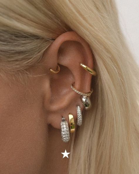 Gold And Silver Jewelry Together Ear, Silver And Gold Piercings, Silver Ear Stack Ideas, Gold And Silver Earring Stack, Silver And Gold Earring Stack, Gold Piercing Stack, Earring Stack Inspo Gold, Ears With Lots Of Piercings, Ear Piercing Arrangements