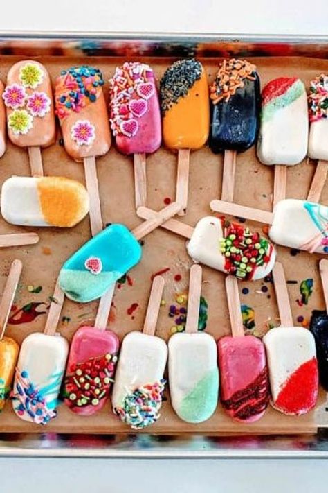 Cake popsicles are large cake pops that are perfect for any get-together! They are made using cake, bound together with frosting, and dipped in a candy coating. They are fun to decorate for any theme, including holidays, baby showers, and gender reveals! | cake popsicles | cake popsicles ideas | cake popsicles recipe | cake popsicle how to make | how to make popsicle cake pops | how to make a cake popsicle Popsicle Cake, Popsicles Cake, Cake Popsicles, Popsicles Recipe, Watermelon Sorbet, Large Cake, Cake Pops How To Make, Mango Sorbet, Recipe Cake