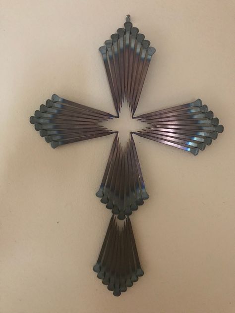 "Handmade cross made with horse shoe nails 15\" by 11\". Pictured with patina. Also can be natural silver color of horse shoe nails." Horse Shoe Cross, Horseshoe Nail Art, Horse Shoe Nails, Clothespin Diy Crafts, Beaded Horseshoe, Horseshoe Crafts Projects, Horseshoe Projects, Rustic Cross, Horseshoe Crafts