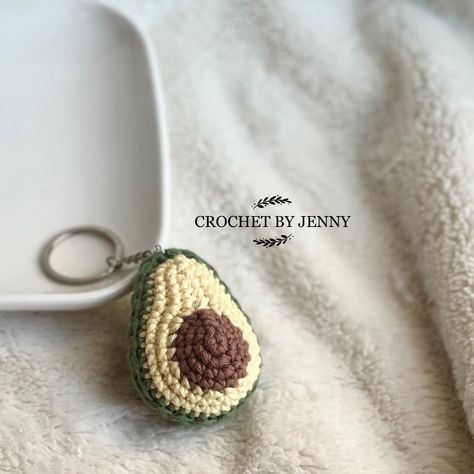 Avocado Keychains are handmade crochet plushies that make cute and unique accessories. They are perfect for🥑 lovers of all.#crochetkeychain #handmadegifts #DIYkeychain #crochetlove #keychainaddict Crochet Avocado Keychain, Cute Crochet Charms, Cute Keychain Crochet, Knitting Keychain, Avocado Crochet, Crochet Avocado, Crochet Charms, Avocado Keychain, Crochet Keychains