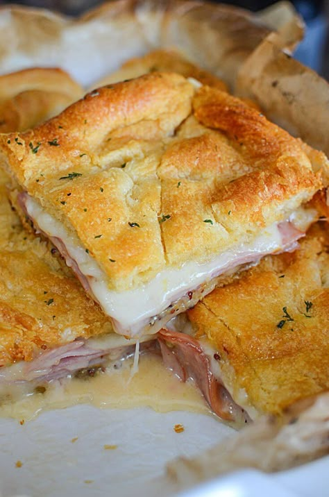 These are the easiest hot ham and cheese sandwiches you'll ever make for dinner! These aren't your typical loaf of bread ham and cheese sandwich! Check them out! - The Salty Pot Hot Ham And Cheese Sandwiches, Hot Ham Sandwiches, Hot Ham And Cheese, Ham And Cheese Sandwiches, Hot Sandwich Recipes, Ham And Cheese Croissant, Crescent Recipes, Ham Sandwiches, Ham And Cheese Sandwich