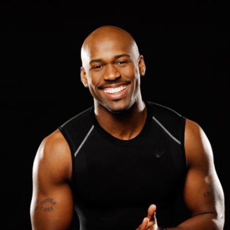 Trying to get into shape? This hunky trainer is the only motivation you'll need! | essence.com Dolvett Quince, Evil Genius, New Trainers, Biggest Loser, Fitness Photoshoot, This Is Your Life, Smiling Man, Fitness Trainer, Good Looking Men