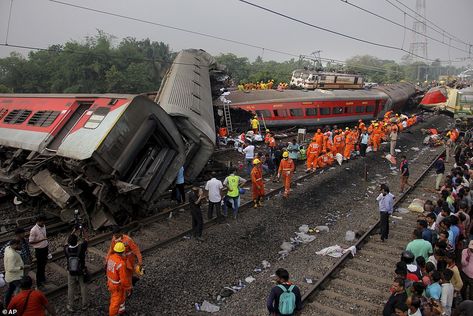 Rescuers battle through wreckage to help survivors in India after train disaster kills nearly 300 | Daily Mail Online Train Accident, Train Crash, Rescue Workers, Disaster Response, Rail Car, Speed Training, Tropical Rainforest, West Bengal, Jena