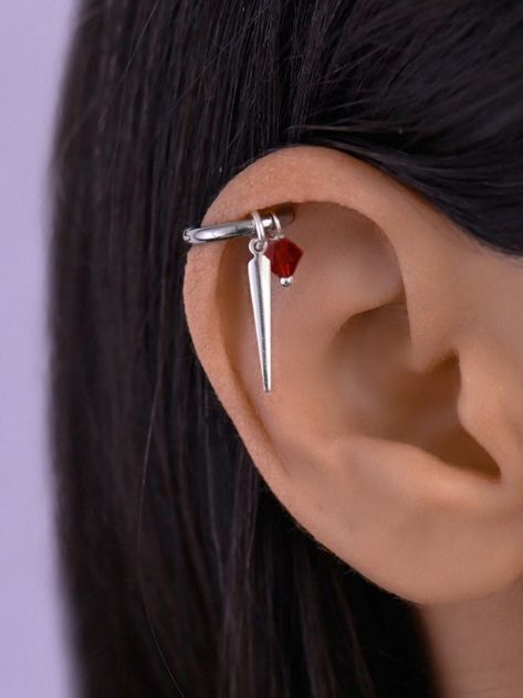 Helix piercing hoop earring with a dangle spike charm and crystal on it. This helix piercing hoop earring is surgical stainless steel. The charms are detachable which is great because they can be worn together or separately. Huggie Hoop - surgical stainless steel (18 gauge) Charm - Sterling silver 925 Shipped with tracking number Dangle Helix Spike Hoop, Helix Earring, Piercing Helix Hoop, Cartilage Hoop Spike Earring, Helix Hoop with Charm, Helix Piercing Huggie Fun Helix Earrings, Punk Style Pierced Dangle Cartilage Earrings, Punk Style Single Hoop Cartilage Earring, Spike Helix Piercing, Helix Hoop With Charm, Goth Helix Piercing, Helix Spikes, Helix Piercing Hoop, Helix Hoop Earring