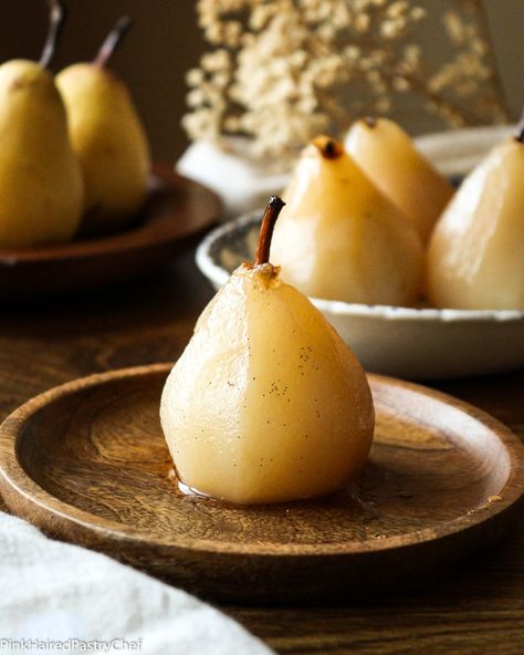 Whole pears that are cooked in a vanilla simple syrup until soft Poached Pears Recipe, Wine Poached Pears, Coconut Oatmeal, Dinner Party Desserts, Poached Pears, Pear Recipes, Simply Recipes, Star Anise, Party Desserts