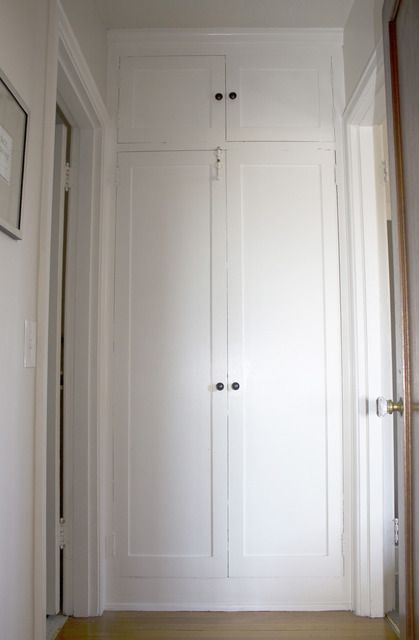 Built-in cabinets at end of a hall - idea for our garage hall next to laundry room door? Upgrade Linen Closet Doors, Linen Cupboard Doors, Wardrobe Transformation, End Of Hallway, Hallway Cupboards, Seattle Apartment, Capitol Hill Seattle, Hall Cabinet, Hallway Closet