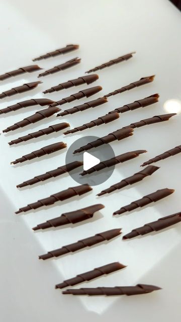 Christian Dewabrata on Instagram: "°Here’s another hands-free chocolate garnish tutorial. Making these kind of hands-free decorations is pretty much hard to make similar looking ones .but as long as we keep the same length and size it will look pretty similar one to another. What we need is just a paring knife, set it to around 20-30° from the surface and push with the same length and pressure. And do it on a semi-set tempered chocolate. Please try!°
•
•
•
•
•
•
•
•
#ChristianDs #CDS #cheftalk #chocolateshowpiece #showpiece #chocolategarnish #flower#chocolatefan #valrhonafrance #chocolatearrangement #pastry #coklat #chocolatefans 
#indonesiapastry #chocolate #garnish #indonesiapastryalliance #pastrychef #pastryart" Chocolate Garnish Ideas, Tempered Chocolate, Chocolate Showpiece, Chocolate Work, Chocolate Garnishes, Wedding Welcome Board, Dessert Presentation, Pastry Art, Chocolate Decorations