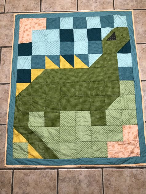 Free Dinosaur Quilt Pattern, Quilt Brick Pattern, Dinasour Quilt Ideas, Dinosaur Quilt Ideas, Dinosaur Quilts For Boys, Dinosaur Quilt Pattern Free Printable, Toddler Quilt Pattern, Gamer Quilt, Baby Boy Quilts Ideas Free Pattern