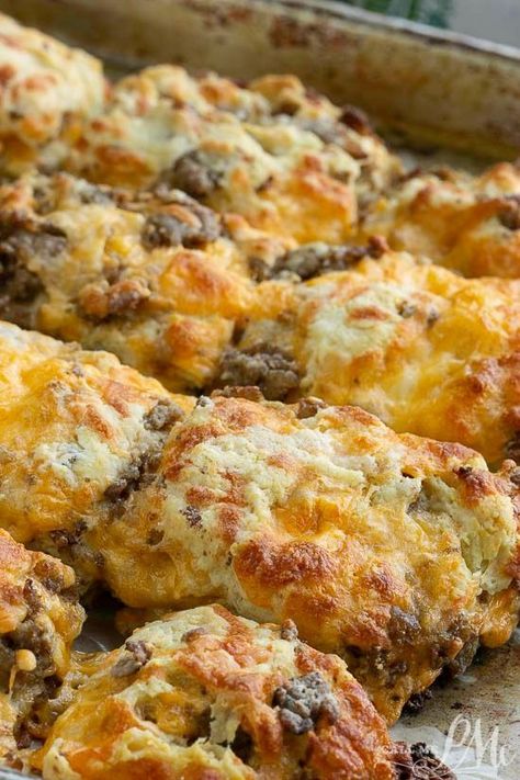 Homemade Sausage Cheddar Biscuits, this portable breakfast has the sausage and cheese baked right into tender and flaky biscuits. Sausage Cheddar Biscuits, Portable Breakfast, Cheese Baked, Cheddar Biscuits, Family Breakfast, Cheese Burger, Homemade Sausage, Breakfast Recipes Casserole, Breakfast Items