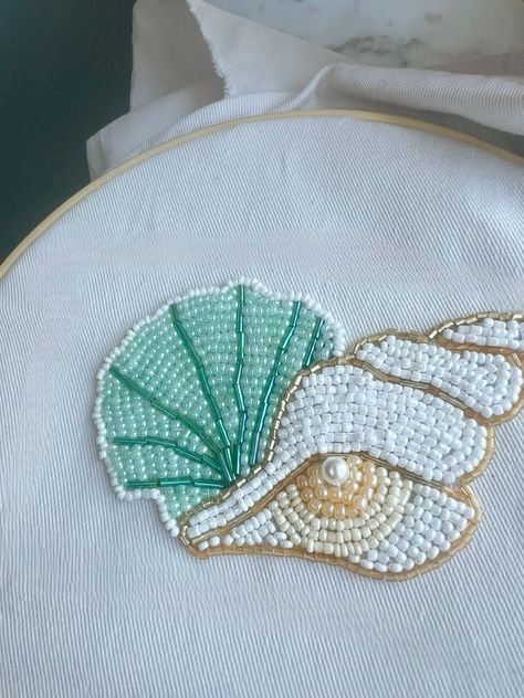 Bead embroidery, seashell bead embroidery, bead embroidered seashell Shell Tshirt, Shell Bead Embroidery, Beaded Seashell, Easy Beaded Embroidery, Easy Bead Embroidery, Embroidery Shells, Beaded Shell, Seashell Embroidery, Shell Embroidery