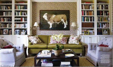 Put something behind the TV for texture if between two tall bookcases (like the texture behind the painting in this photo) Bookcase Behind Sofa, Markham Roberts, American Interior Design, Colourful Interiors, Mark Sikes, Reading Lamps, Office Den, Sitting Rooms, Green Velvet Sofa