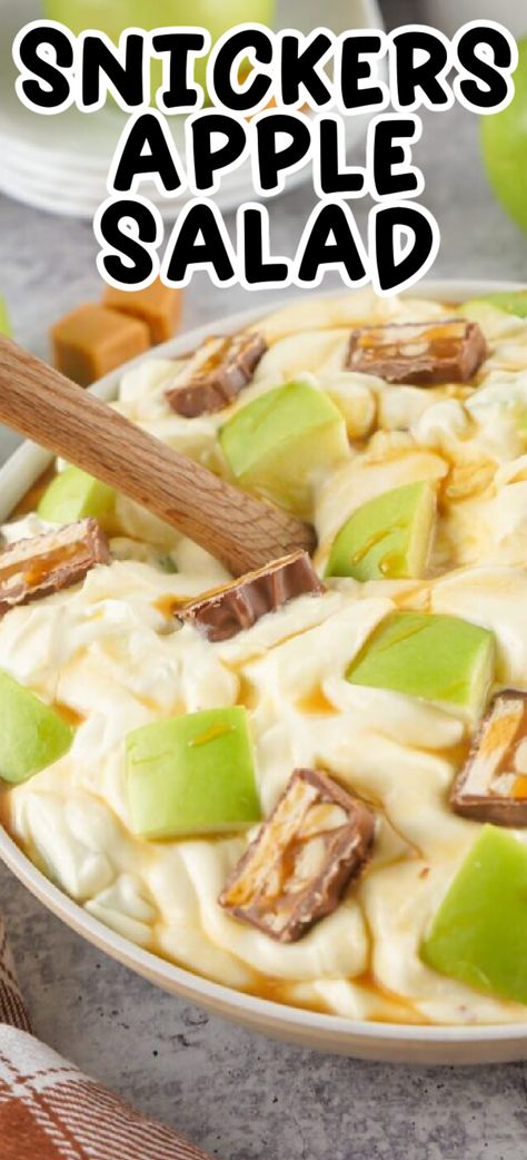 Snickers Apple Salad – Serve this old fashioned Snickers Salad at your next gathering! A rich vanilla pudding mixture is paired with chunks of green apple and Snickers, before being topped with a caramel drizzle. A dessert or side? You choose! Green apple, grape, snickers pudding salad, dessert salad, protein snickers salad, easy snickers apple salad, dessert salad recipes. Snicker Carmel Apple Salad, Granny Smith Apple Snickers Salad, Green Apple Snicker Salad, Caramel Apple Snickers Salad, Apple Twix Salad, Snickers Dessert Recipes, Apple Snicker Salad Recipe, Snicker Apple Salad Recipe, Snickers Pudding