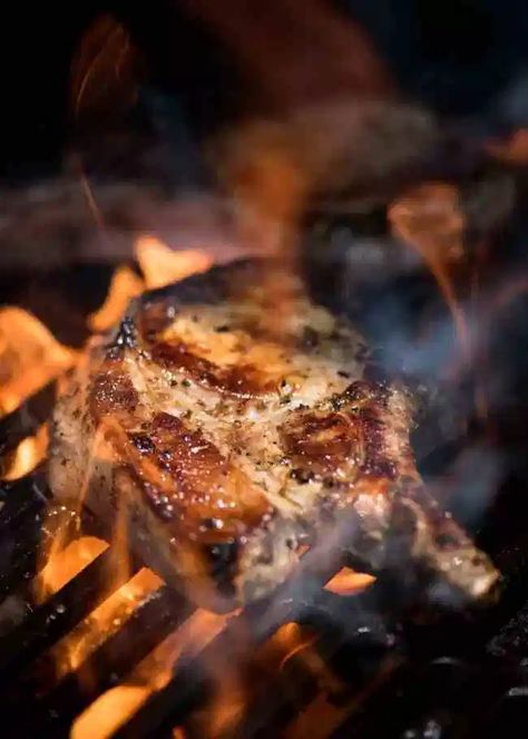 Lemon Garlic Marinated Grilled Pork Chops on the barbecue being licked by flames. Marinated Pork Chops Grilled, Pork Chops Bone In, Barbecue Pork Ribs, Marinated Pork Chops, Bbq Pork Ribs, Bbq Shrimp, Pork Rib Recipes, Recipetin Eats, Propane Grill