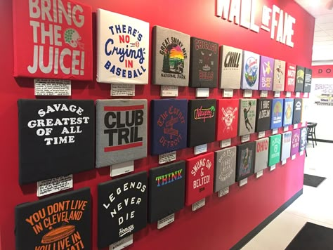 Tshirt Wall Display Ideas, Merch Wall Display, Apparel Display Ideas, Concert Tshirt Display, Graphic Tee Display, T Shirt Pop Up Shop Display Ideas, Concert Merch Display, Merch Display Ideas, Band Merch Display