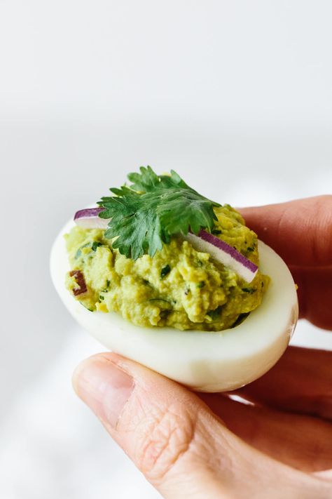 Avocado deviled eggs are an easy, tasty variation of the classic recipe. If guacamole and deviled eggs had a baby, this would be it! Wildfit Spring, E2m Meals, Downshiftology Recipes, Wildfit Recipes, Fwtfl Recipes, Classic Egg Salad Recipe, Guacamole Deviled Eggs, Avocado Deviled Eggs, Eggs Avocado