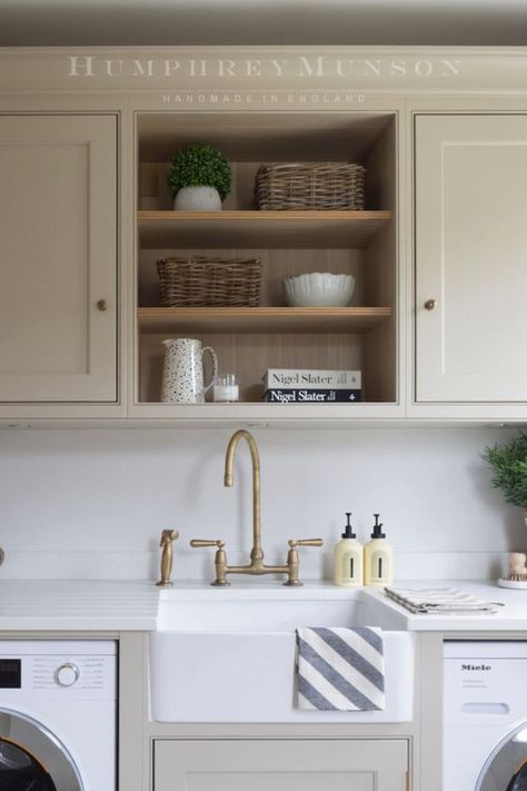 A luxury laundry room designed with plenty of open shelving, cupboard space, a large butler sink and a @MieleGB washing machine and tumble dryer. The cabinetry is by Humphrey Munson and finished in neutral paint colour 'Trim'. Open Shelving In Utility Room, Butler Sink Utility Room, Luxury Laundry Room, Boot Rooms, Luxury Laundry, Cupboard Colors, Room Design Inspiration, Utility Room Designs, Humphrey Munson