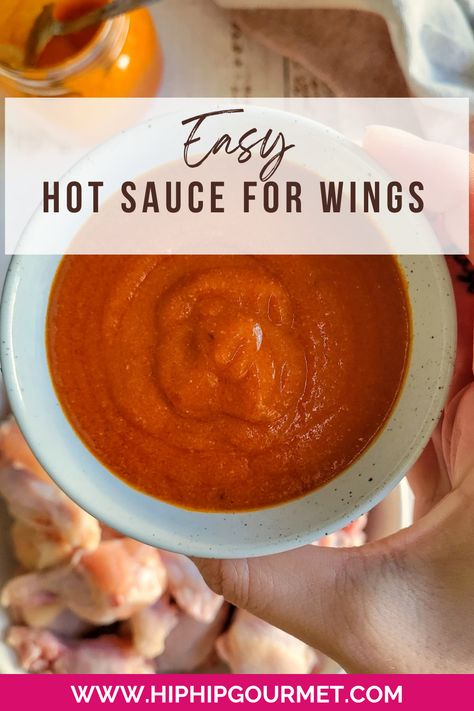 hand holding a bowl of red sauce over a plate of raw chicken wings Recipe For Wings, Hot Wing Sauce Recipe, Wing Sauce Recipe, Hot Wing Sauce, Homemade Wings, Chicken Wing Sauce Recipes, Healthy Ranch Dressing, Hot Sauce Recipe, Hot Wing Sauces