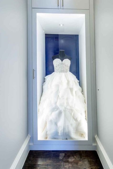 Wedding Dress In Closet, Closet With Wedding Dress Display, Wedding Dress Closet Display, Wedding Dress Display In Closet, Wedding Dress Storage Ideas Display, Wedding Dress Storage Ideas, Wedding Dress Cabinet Display, Wedding Dress Display Ideas, Glass Case For Wedding Dress