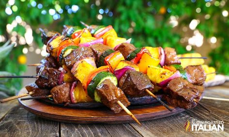 Hawaiian beef kabobs are delicious with tropical flavor! Grilled pineapple, veggies and marinated beef makes the best shish kabob recipe! Hawaiian Beef, Shishkabobs Recipe, Beef Kabob Recipes, Slow Roasted Italian, Steak Kabobs, Shish Kabobs, Beef Kabobs, Shish Kebab, The Slow Roasted Italian