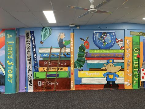 School Library Wall Painting, Library Window Painting, Book Character Mural, School Office Makeover, Library Murals Elementary, Book Mural Wall Art, Library Mural Ideas, Reading Mural, Book Mural