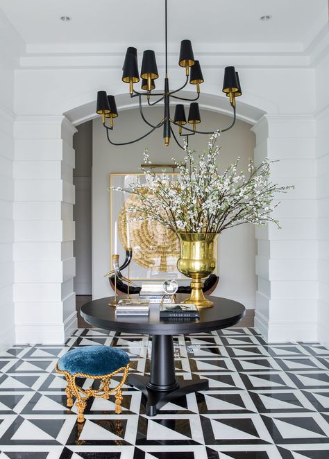 House Tour: In Orem, Traditional Design Gets a Fresh Twist in a Stunning Family Home Round Foyer, White Foyer, Arched Doorway, Utah Style, Alice Lane Home, Alice Lane, Large Chandelier, Foyer Table, Patterned Floor Tiles